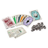 Collection of playing cards and game pieces on a white background