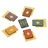 Set of colorful playing cards with decorative designs on a white background