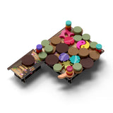 A 3D isometric render of a colorful wooden toy set, featuring a long brown wooden board with painted details, numerous round wooden discs in various colors, and small stacked wooden towers, all displayed on a clean white background with soft drop shadows.