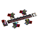Collection of colorful board game components on a white background