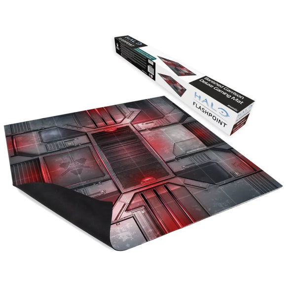 Gaming mat with 'HALO' branding and a box in the background