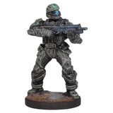 Toy figure of a soldier in tactical gear with a rifle on a white background