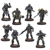 Set of eight miniature figures in tactical gear with weapons on a white background