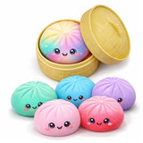 Set of colorful squishy toys with smiling faces in a yellow container on a white background