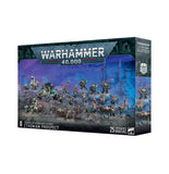 Warhammer 40,000 game box with miniature figures on a white background