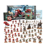 Collection of Warhammer 40,000 miniatures and game materials on a white background