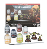 Warhammer 40,000 Boyz + Paints box with paint pots, brush, and miniatures on a white background