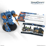 Blue robot figurine with game cards on a white background