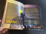 Open book with 'Severed' title on a dark surface