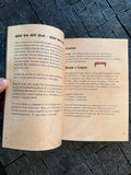 Open book with text on a textured surface