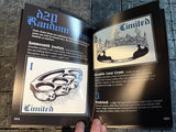 Open book showing pages with illustrations and text on a textured surface