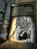Open book with a dark fantasy illustration of a skeleton character holding a staff, surrounded by text.