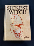 Book titled 'Sickest Witch' with a skull and hood design on a dark background