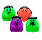 Four small ghost-shaped stress toys in bright green, orange, and purple, each with a black hair-like top detail and a printed face, shown on a plain white background.
