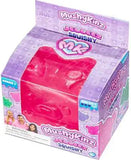 Pink toy figure in a 'Mushy Kinz' packaging with purple background