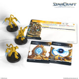 StarCraft game components including miniatures and cards on a white background