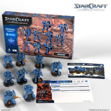 StarCraft miniatures game set with figures, cards, and box on a white background