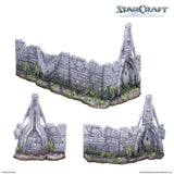 Stone ruins with grass on a white background, featuring the StarCraft logo.