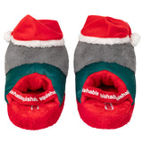 Pair of plush slippers with a Santa hat design on a white background