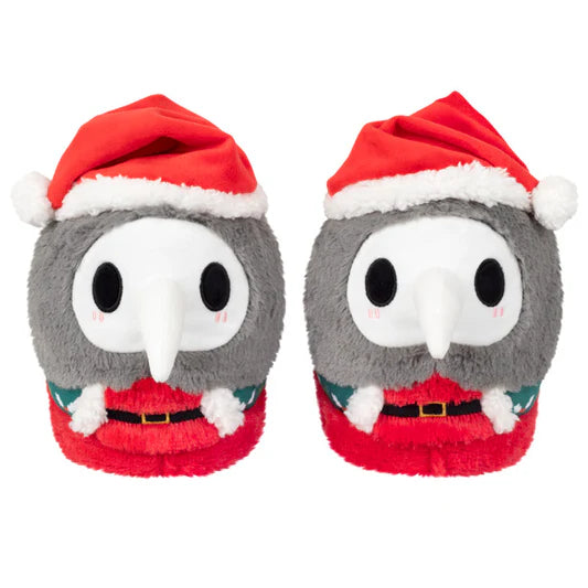 Pair of plush slippers with a Santa hat design on a white background