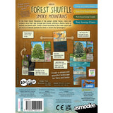 Back cover of the 'Forest Shuffle: Smoky Mountains' card game by Asmodee Games, featuring a brown and blue layout with illustrations of cards, gameplay diagrams, and product details.