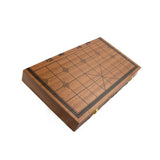 Wooden chessboard with checkered pattern on a white background