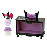 Toy vanity set with mirror, stool, and decorative items on a white background