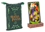 Hocus Pocus themed product with green drawstring bag and card featuring witches on a white background