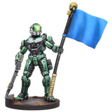 Toy figure in green and black armor holding a blue flag on a white background