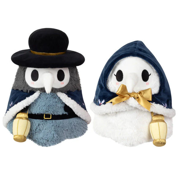 Two plush toys resembling characters in formal attire on a white background