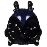 Black and blue plush toy with a smiling face on a white background