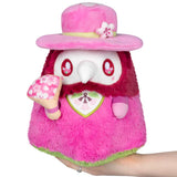 Plush toy owl with pink hat and dress holding an ice cream cone on a white background