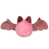 Pink plush toy with bat wings on a white background