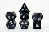 Set of black polyhedral dice with white numbers on a white background