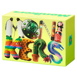 A bright lime green rectangular box featuring colorful illustrated artwork spelling 'monikers' with penguins, a UFO, a snake, a cactus, nesting dolls, and other playful motifs on a plain white background.