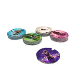 Set of colorful coasters with various designs on a white background