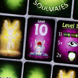 Close-up of a card grid showing illustrated cards with glowing green and purple effects, including a central card labeled 'Level 10' with a rabbit character and icons for 11, 5, and 2 copies.