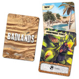 Two cards from a game, one labeled 'Badlands' and the other with a desert scene and carnivorous plants.