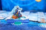 Board game piece with a character on a whale, set against a blue game board.