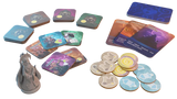 Collection of colorful game cards and tokens on a white background
