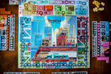 Board game with colorful cityscape layout on a wooden table