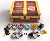 Wooden collector's box with collectible items on a white background