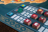 Board game setup with cards and markers on a map of North America