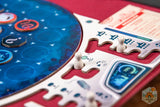 Close-up of a board game with blue and red elements