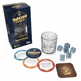 Yahtzee on the Rocks game set on a white background, including the navy blue retail box, a clear textured drinking glass, several translucent ice dice, round instruction cards, and a wooden score card.