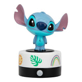 Toy figure of a character with a colorful base on a white background