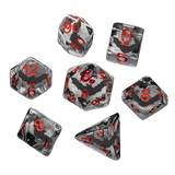 Set of transparent dice with red numbers on a white background