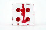 Clear block with red abstract design on a white background