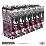 Multiple boxes of Marvel HeroClix Venom game sets on a white background