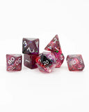 Set of colorful polyhedral dice on a white background